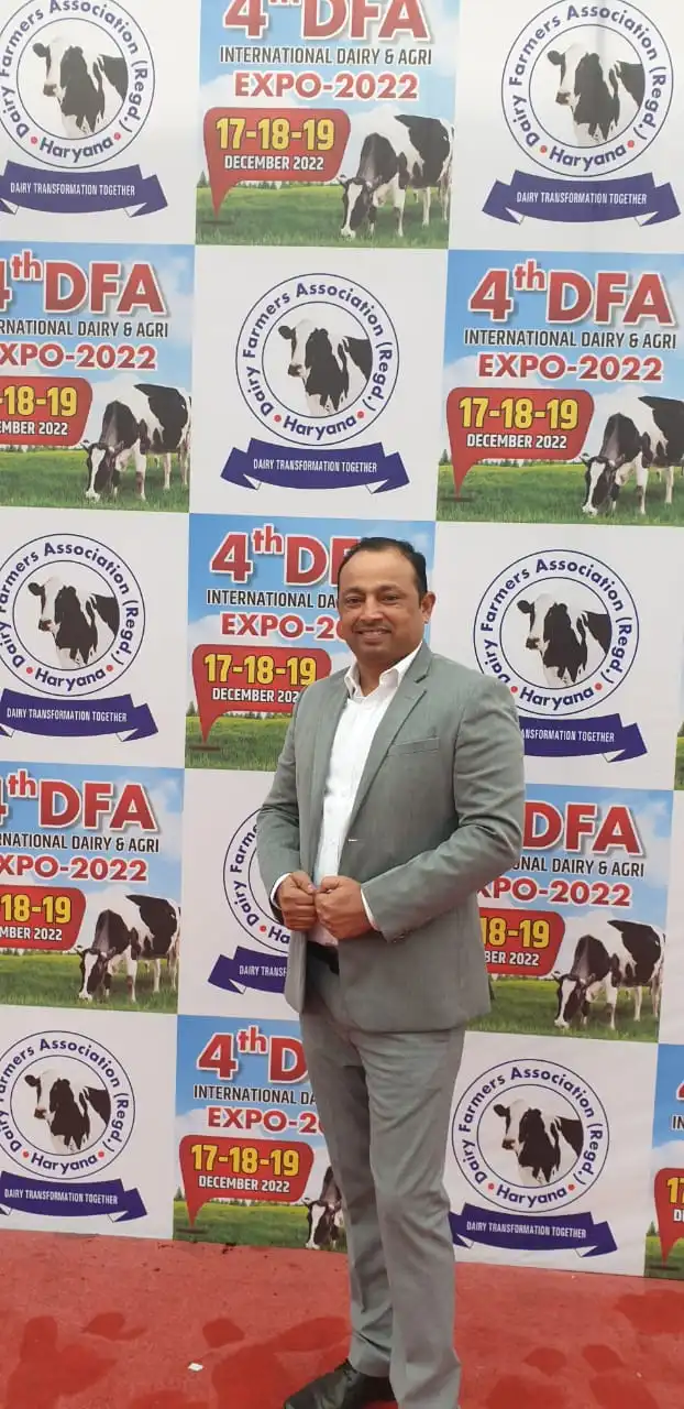 Home Bhagat Suryavanshi attending the International Dairy & Agri Expo 2022 in a grey business suit – Zelora Naturals™ customer.